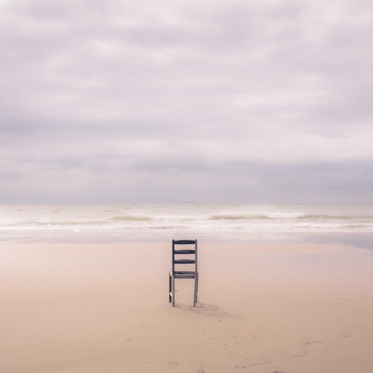 We were on the far end of Oxwich beach yesterday, and I found an old wooden chair, presumably washed up. Cue artistic, if slightly odd, photo.