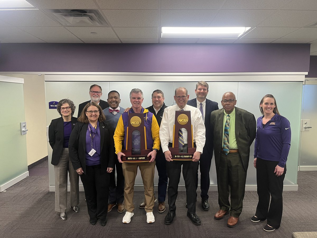 MinnStAthletics's tweet photo. The  administrative “team behind the team” shares a moment with the trophies this morning following the Presidential Cabinet meeting https://t.co/A7AwWeV6z6