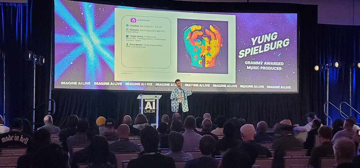 Grammy-awarded Yung Spielburg presents AUDIOShake at #ImagineAILive24, bringing AI power to music pros for smarter production workflows. 🎵✂️🤖 #MusicTech #AI #YungSpielburg