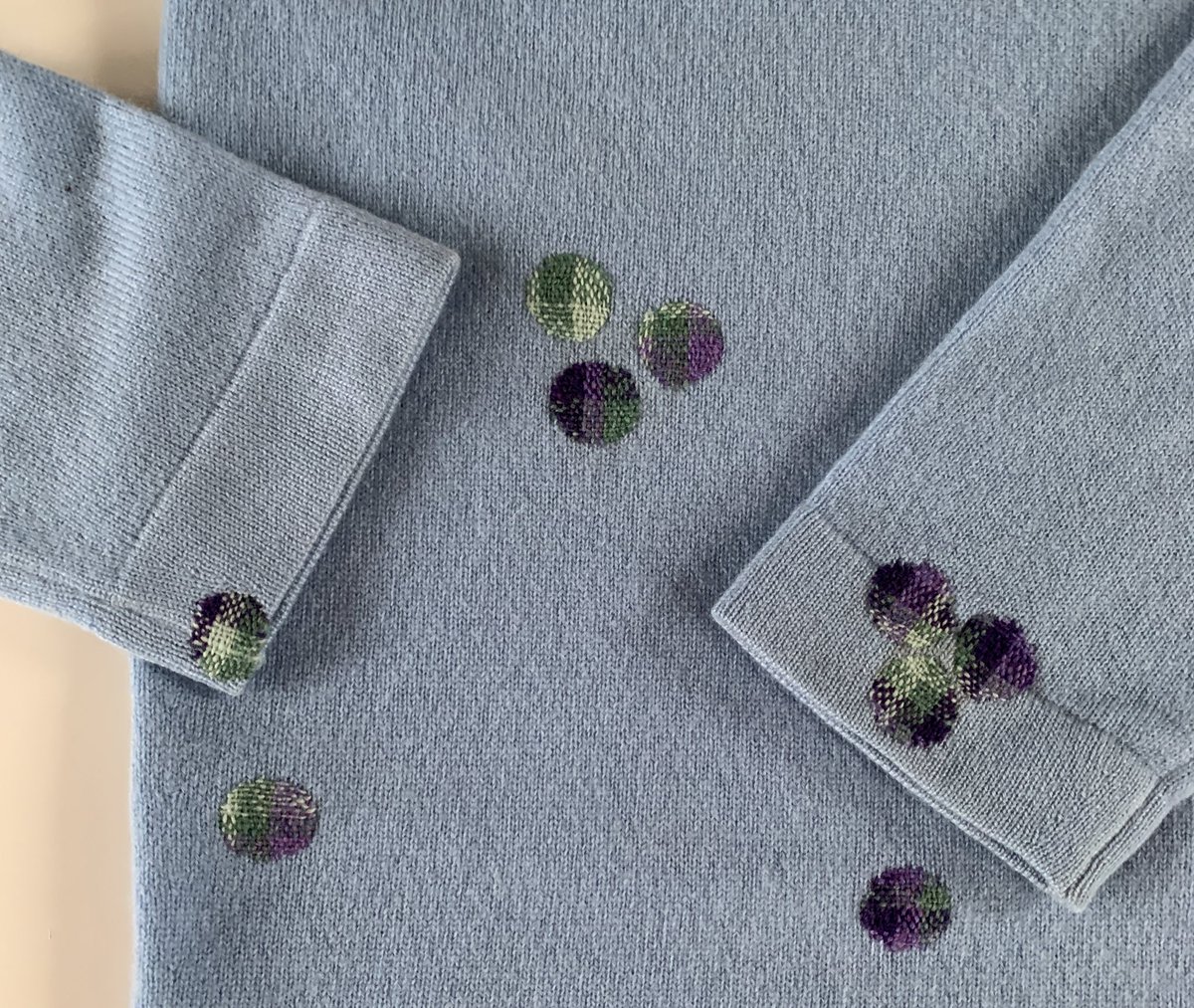 Tiny holes and stains turned into little darned dots! #visiblemending #darning #repair #makedoandmend #reducewaste #lovedclotheslast #SustainableLiving