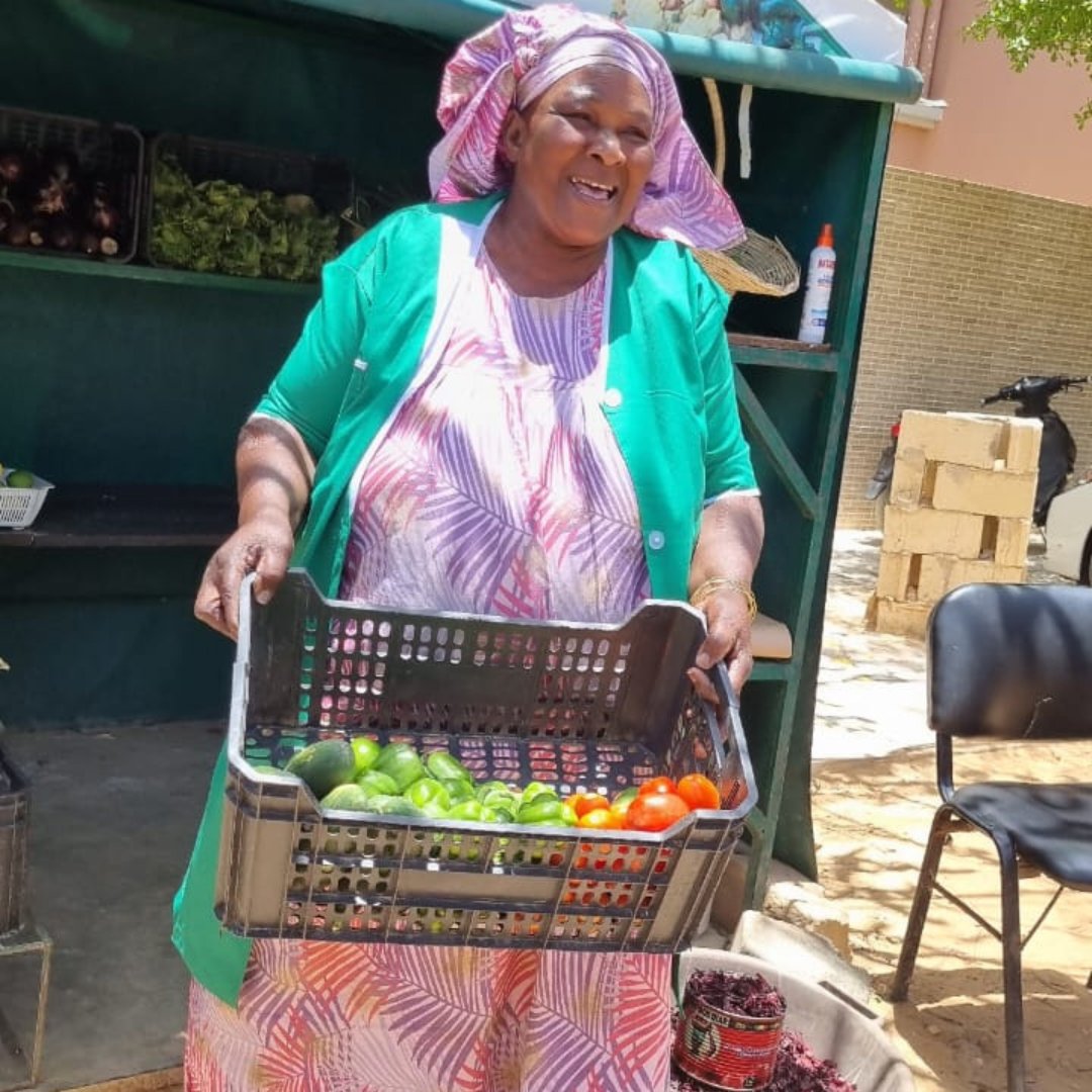 #Empoweringwomen in #agroecology is crucial for #sustainabledevelopment. Pictured: A woman who uses agroecological farming methods sells her vegetables on the streets of Theis, #Senegal.