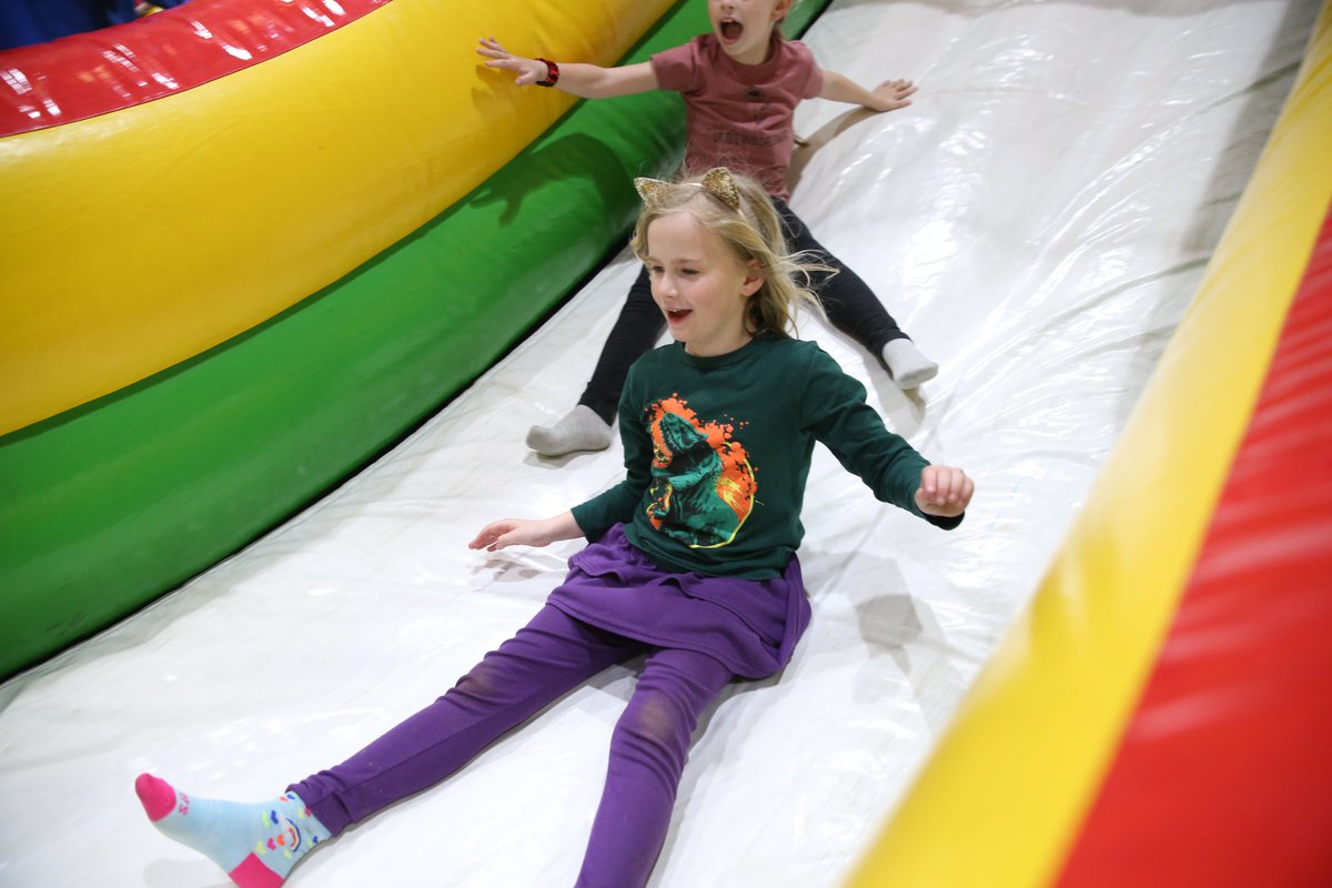 Inflatables inside a gym? No, it's not an #AprilFools joke, it's just Spring Break Kids Club at Northpoint having a blast! #PHMExcellence