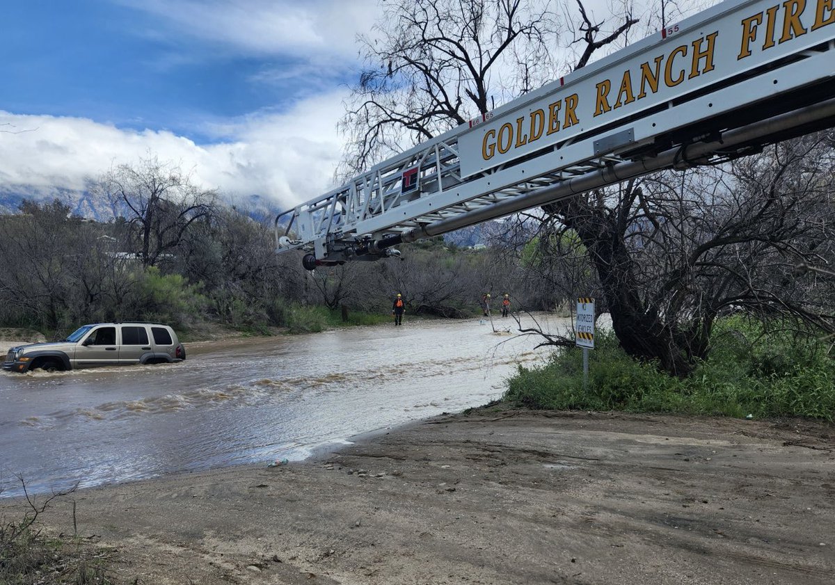 GRFDAZ's tweet photo. SWIFT WATER RESCUE: Golder Ranch Fire crews responded to one SUV stuck in the CDO crossing at Wilds Rd. Our firefighters were able to rescue the driver, the only occupant inside the vehicle. No injuries reported. 

As rain continues to move through our area, please remember TURN AROUND, DON’T DROWN. 

#incident #alert