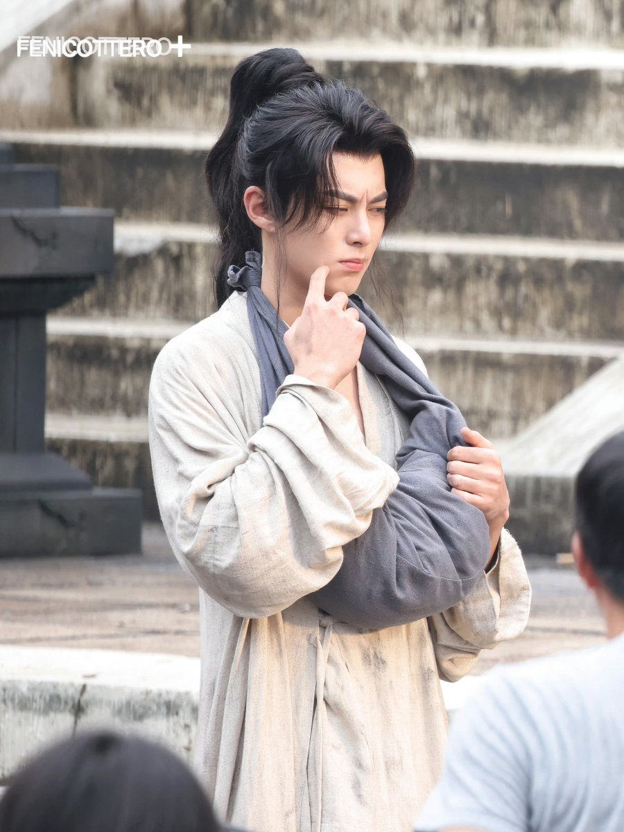 240402 #GuardiansOfTheDafeng new reuters released today by fansite  FENICOTTERO of #DylanWang as #XuQiAn wearing what looks to be prison rags. 

Even in rags, Dylan still looks like a supermodel. His face card and proportions are just superior and can't be concealed 😅

#WangHedi