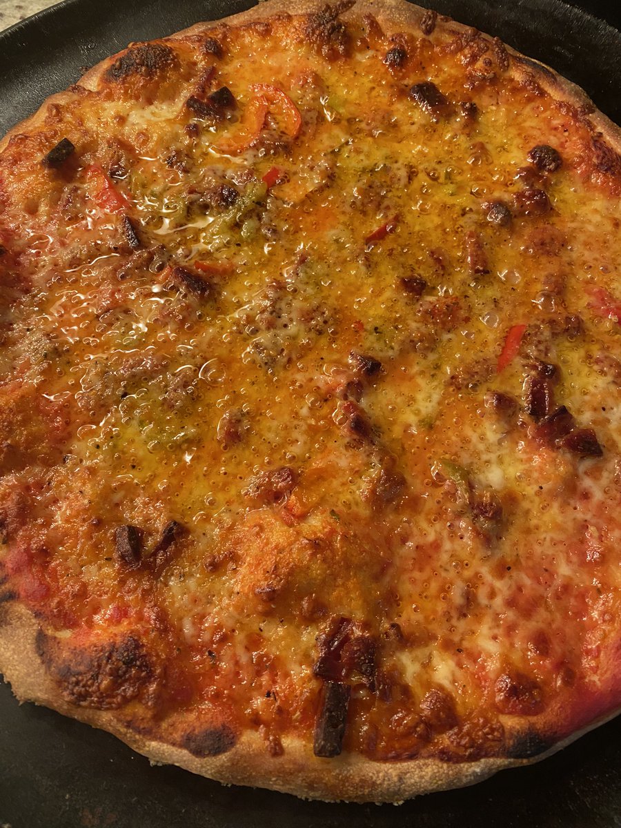 Monday pizza. 4 day old Whole Foods dough. I cut it in half, let it get to room temp and it stretches well into a nice thin crust. Not bad.