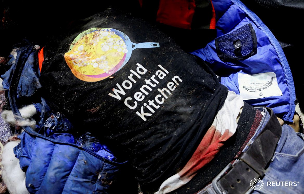 The body of an employee from the World Central Kitchen (WCK) non-governmental organization, who was killed along with foreign aid workers in an Israeli airstrike according to the Gaza government media office, at Al-Aqsa hospital in Gaza, April 1, 2024. REUTERS/Ramadan Abed