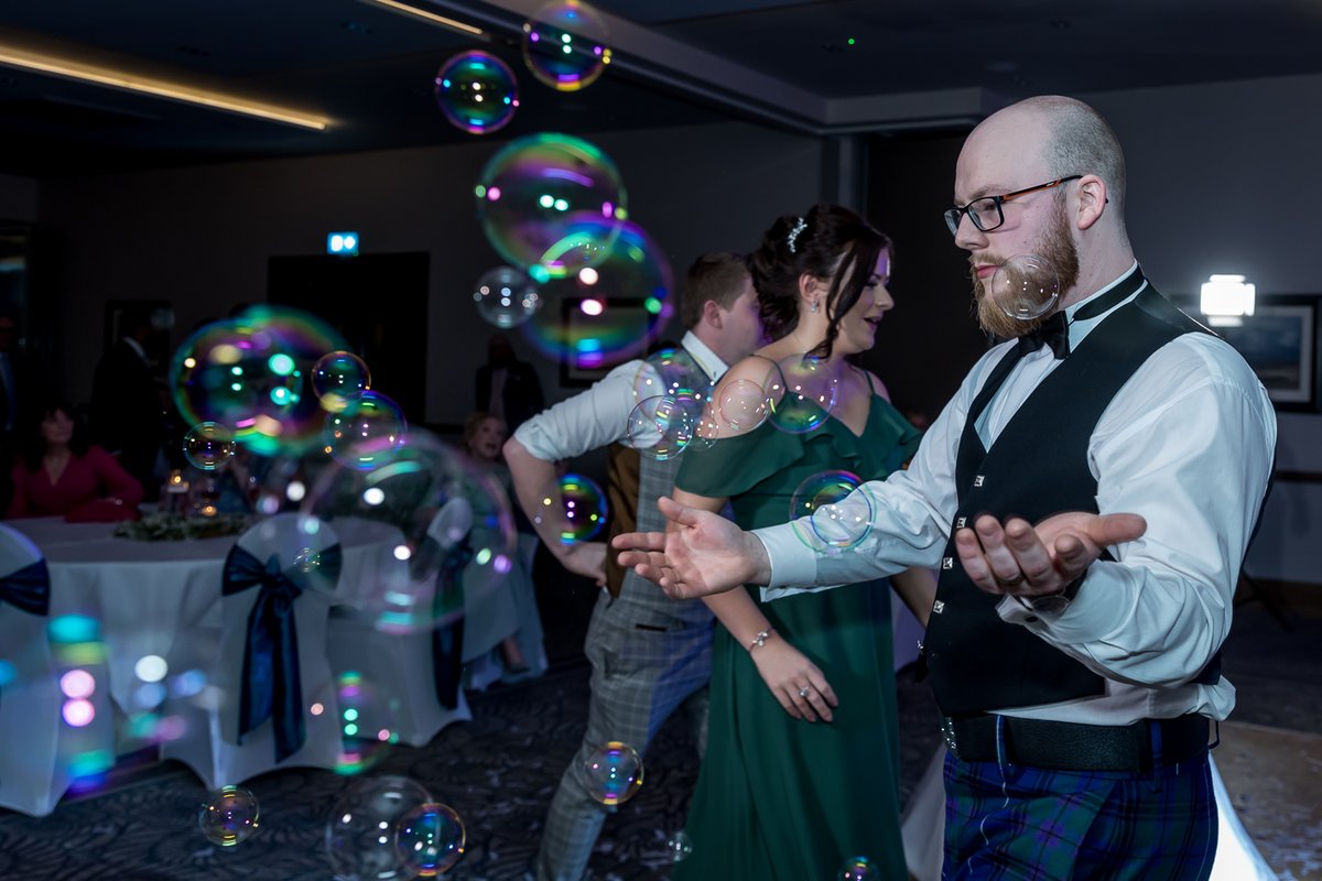 We brought the bubble machine out and The Groom (Ewan) is either playing with the bubbles or dancing with an imaginary friend....What's your thoughts? @HotelWaterside @simpsinns