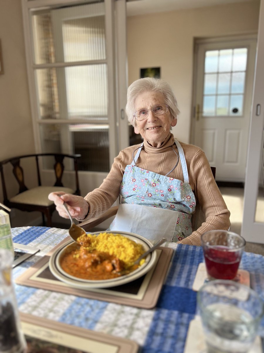 CompleteCareWY's tweet photo. Look at the pure joy on our client's face as she wears her apron and enjoys her delicious curry meal 🤗🍛 #Caregiving #Happiness #ClientAppreciation #CompleteCareWestYorkshireLtd https://t.co/FfNl91tELM