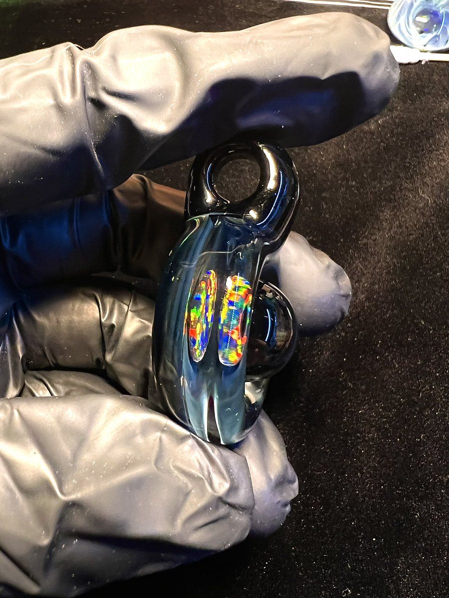 Some of my physical art.
Black opal coin encased in borosilicate glass 🫶💎