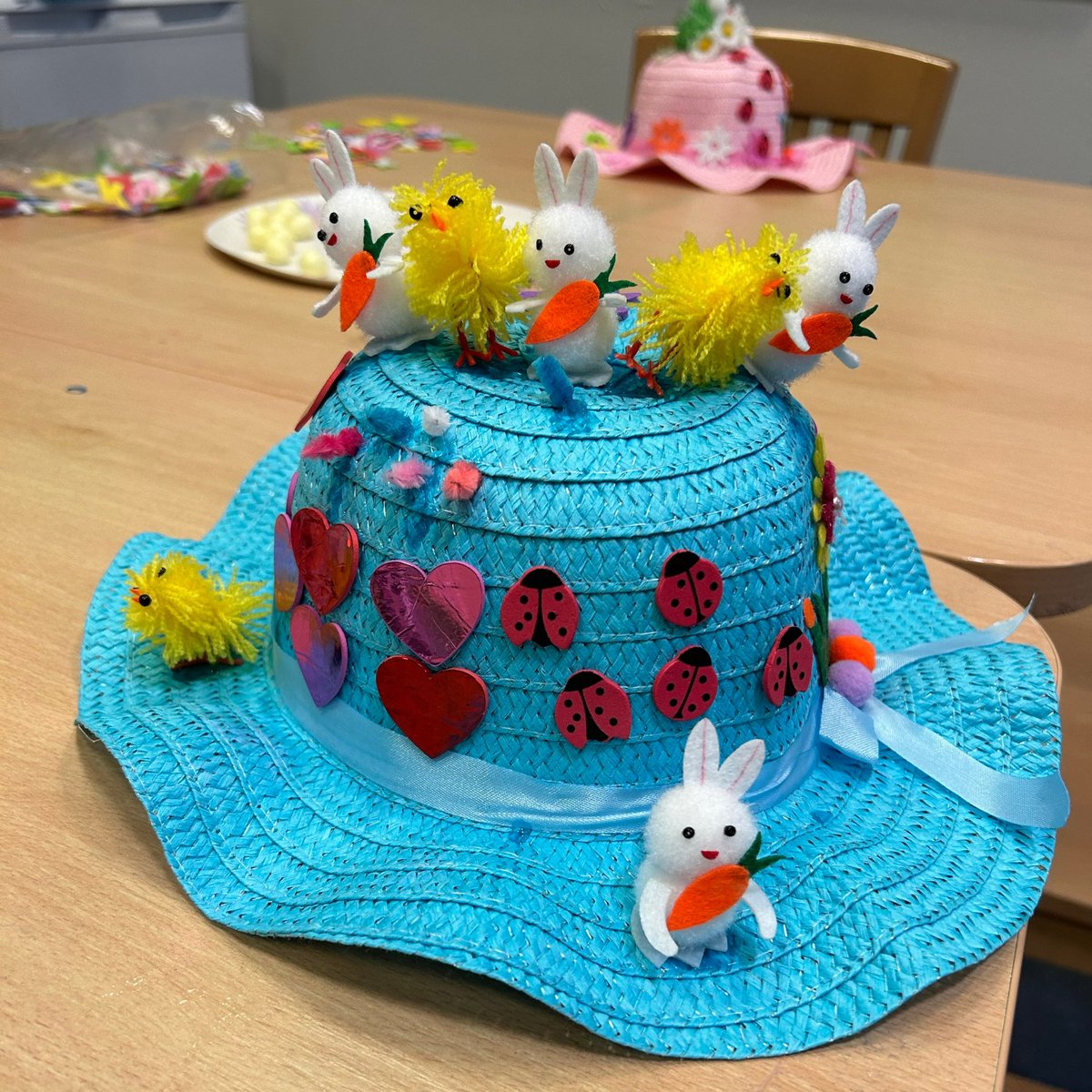🐣🍫👒Young people and adults alike got very competitive making home-made Easter Bonnets. Each colourful creation showed great imagination. 🤩Look at the three winning designs.