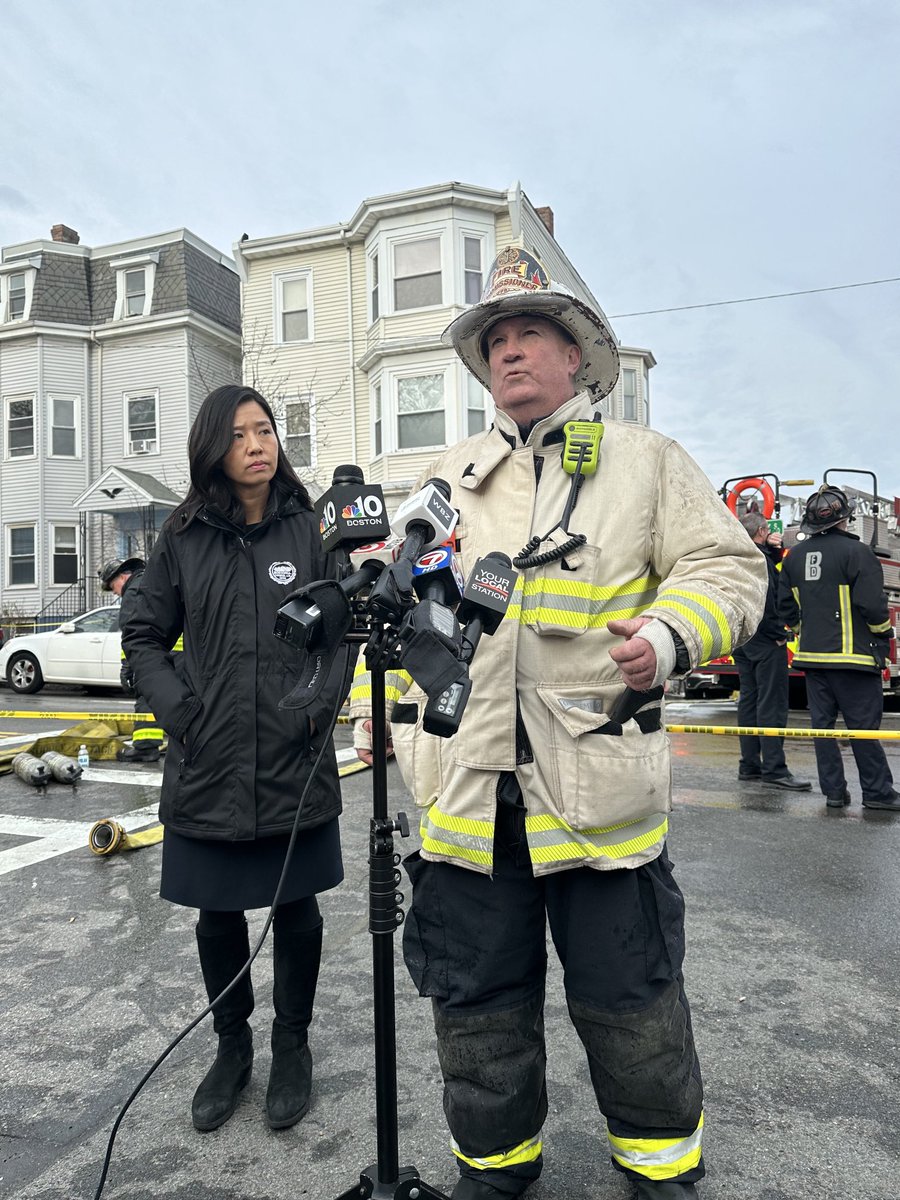 Commissioner Burke and ⁦@MayorWu⁩ brief the media on the 6 alarm fire in East Boston. 5 residents were rescued over ladders but sadly there was 1 fatality.