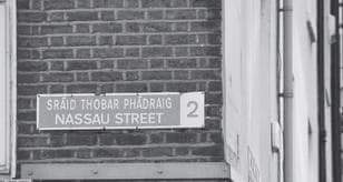 There's a 1,600 year old hidden holy well in a very unexpected place. You likely passed it a thousand times. There was even a cryptic clue to its location, on a now vanished old street sign for Nassau Street. The former Irish name mysteriously said, 'Sráid Thobar Phádraig'....