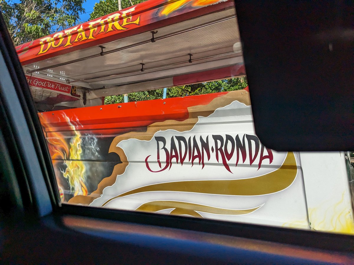 Spotted this in Cebu, Philippines. Lots of the tricycles(motorcycles with passenger seating) and transports are decorated with names, religious slogans, and art. Stickers, anime, etc. There was a full lina on the side but we passed quick so that's what I've got. 😊