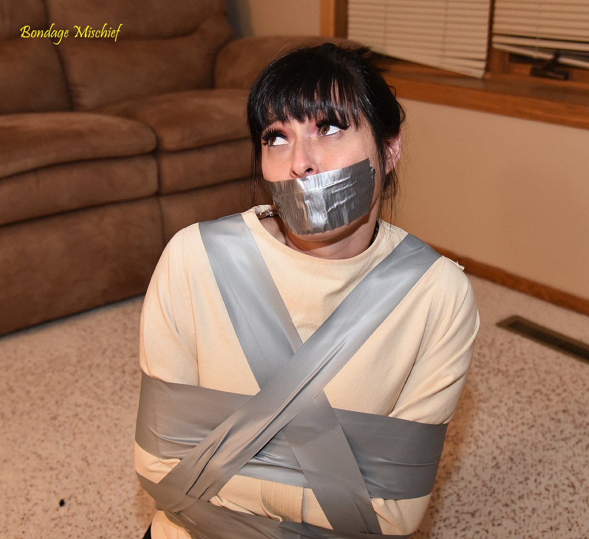 What is one way to make sure @lilmizzunique doesn't leave the house? How about a straight jacket and duct tape. See how effective it is in this archive set available now at bondagemischief.com/updates/unique…, @paysitemanager