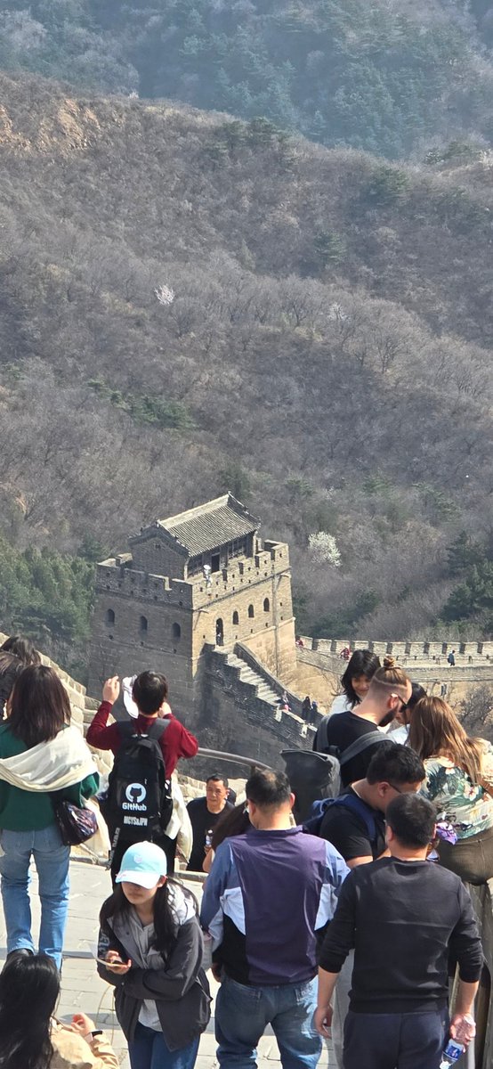 Scaling the Great Wall of China and what do I find? A #github backpack, from all the places lol 😆