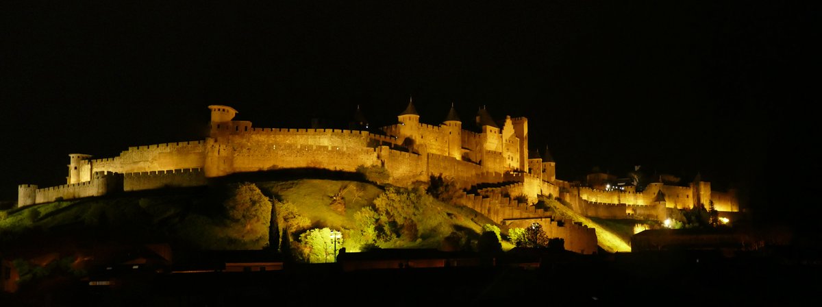 Impressive ramparts & towers of medieval Carcassonne -spent the day exploring the narrow streets, castle & walking the ramparts. nighttime view from our hotel roof terrasse #BuyIntoArt