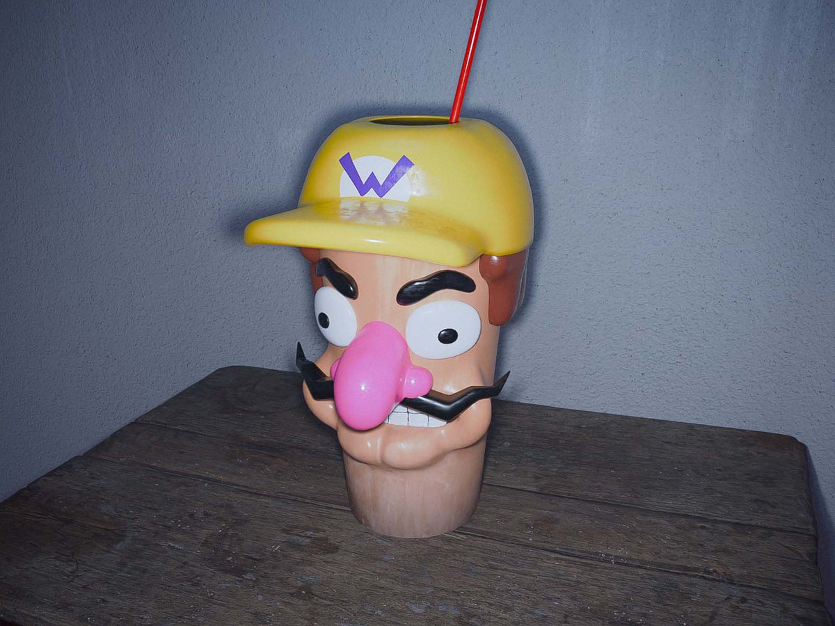 CutVideoGame's tweet image. RARE: Promotional 7 Eleven “Wario” Cup, 2004
