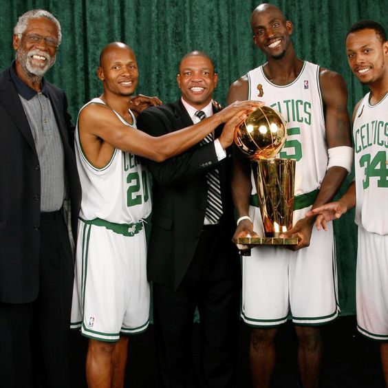 Bill Russell, Ray Allen, Doc Rivers, Kevin Garnett, and Paul Pierce with the 2008 championship trophy.