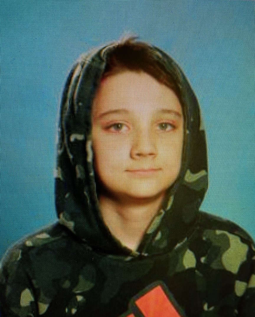 Missing: Oliver, 12 y/o, White male, 5'4, 100lbs, blue eyes, brown hair w/ purple and yellow streaks. Last seen wearing gray pants, blue hooded sweatshirt w/mushroom chasing human cartoon. Last seen in Downtown Seattle near 4th Ave and James St. If seen please call 911.