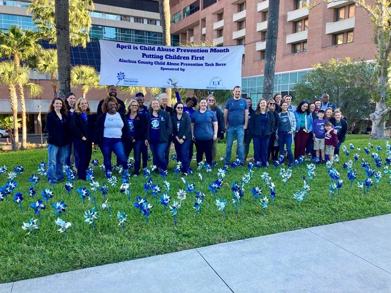 April is #ChildAbusePrevention Month. Blue & silver pinwheels at UF Health Shands symbolize hope & support for all children. Join us. 🌀💙 #PinwheelsForPrevention