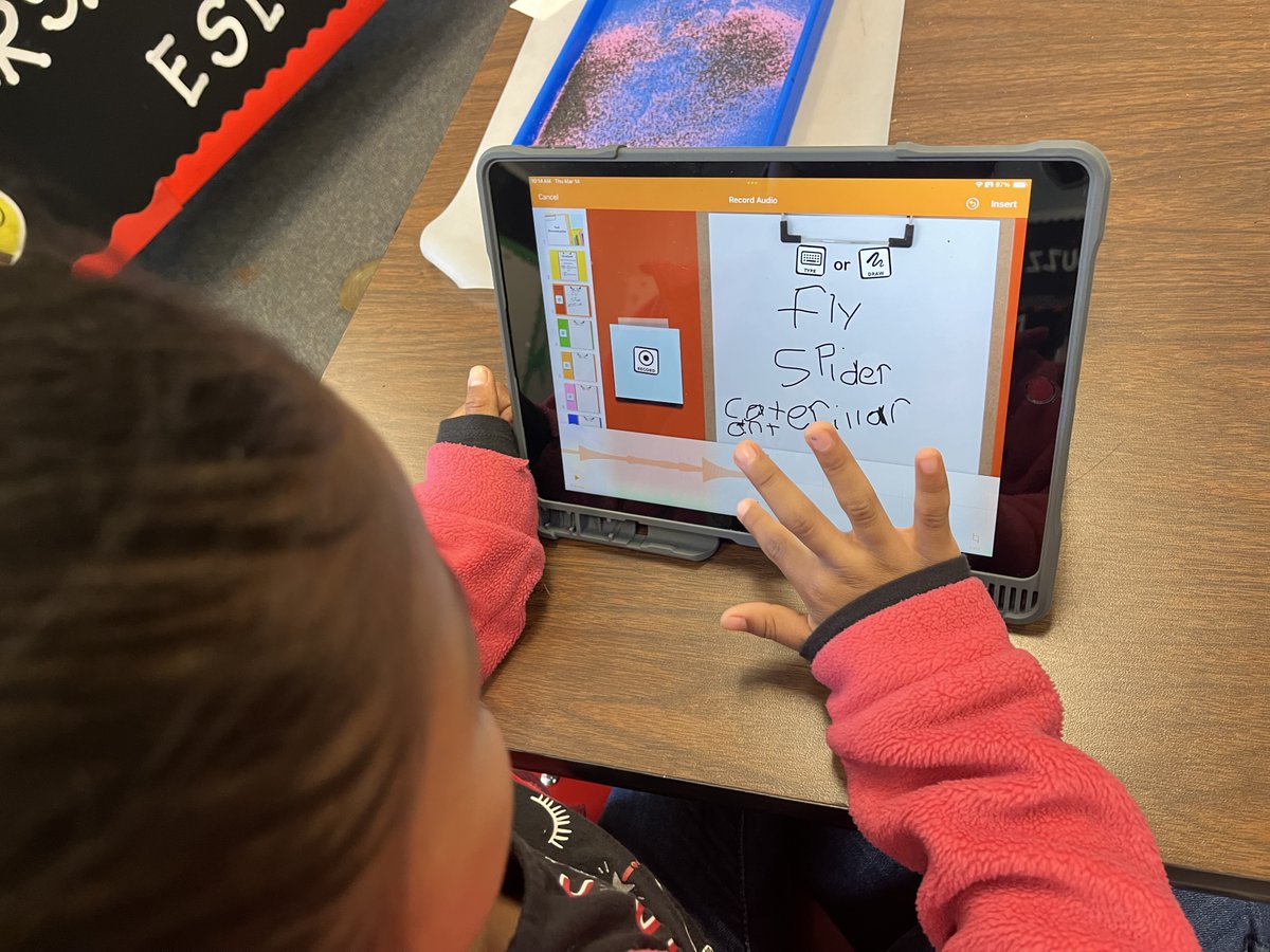 gardnerkb1's tweet photo. #Kindergarten &amp; #Firstgrade #ML Ss practice writing &amp; reading in a Text Reconstruction book. In this #ELL teaching strategy Ss listen to teacher dictate vocab. words/sentences, write, record reading their writing. Ss use anchor charts for support @AppleEDU #TESOL #blendedlearning https://t.co/yKbRkiaq2g