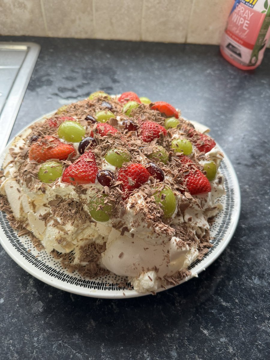 Todays creation. Fresh fruit pavlova with cadburys Diary Milk Chocolate shavings.