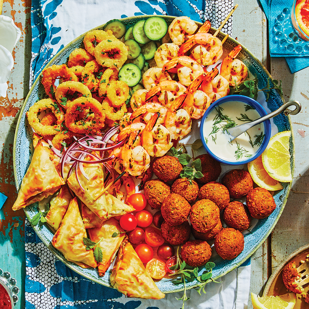 Picture it, you're on a yacht in the Mediterranean. This sea-worthy spread can make you feel closer to the surf. Arrange marinated Herb and Garlic Shrimp Skewers, Spanakopita, our tahini-filled Falafels and some Buttermilk Dill Dipping Sauce on a platter. ow.ly/OkxL50R4Tk7