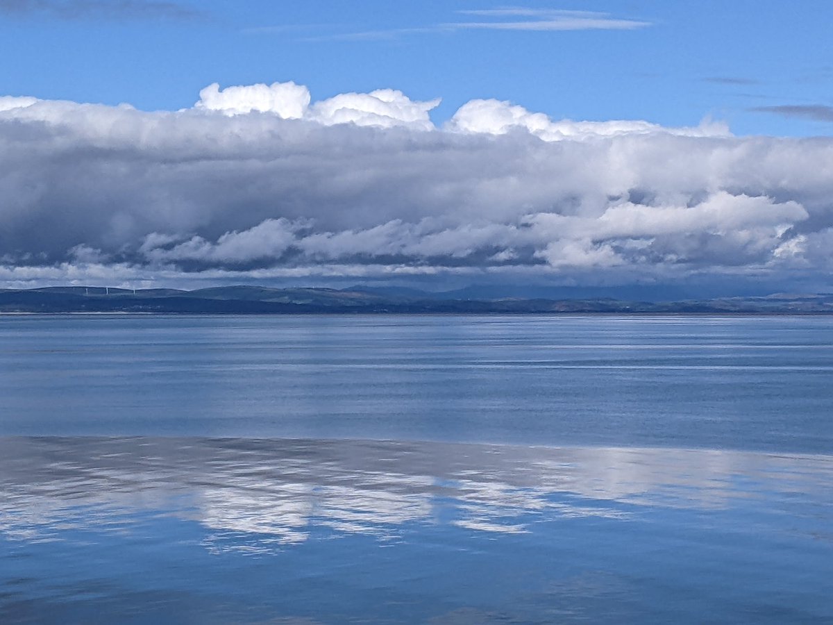 Three clouds in a mountain... Morecambe Bay