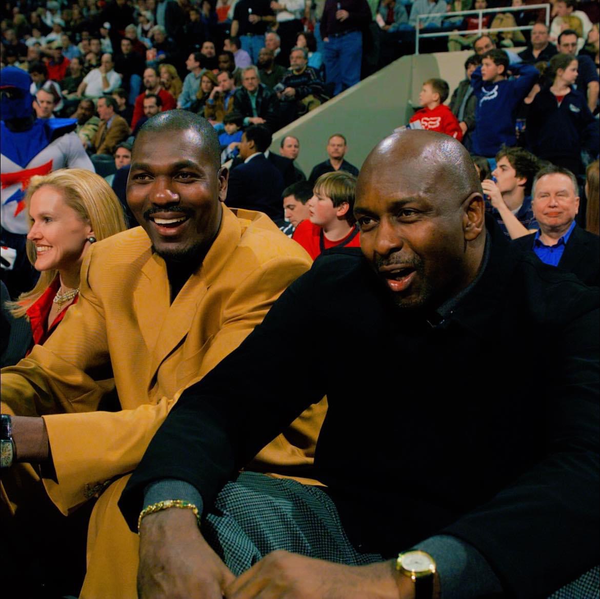 Hakeem Olajuwon and his mentor Moses Malone.