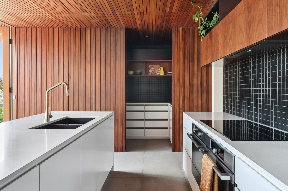 A 5 bedroom $3 million house, part 2.
Absolutely stunning interiors.
The kitchen.
There's a hidden door to the pantry.
What a view - feels like a tree change but it's close to the city.
What do you think?
#kitchendesign
#homedesign
#interiordesign
#interiors
#interiordecor
