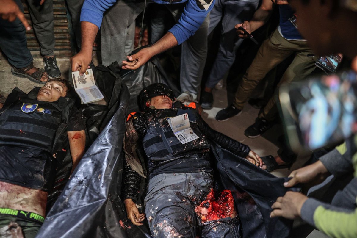 Bodies of the officials working at international volunteer aid organization World Central Kitchen are seen after an Israeli attack on a vehicle belonging to WCK in Deir Al-Balah of Gaza.