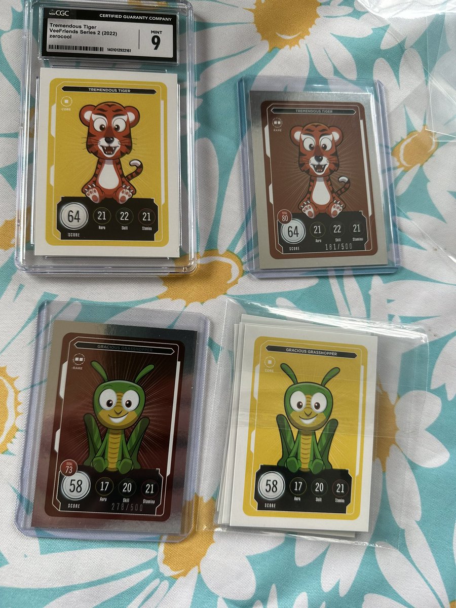 noneisrighteous's tweet photo. It’s a @VeeFriendsCards mail day! Received grasshoppers and tiger 9 slab...SAME DAY Opened up first ever pack w my son to reveal another tiger rare. 🐅 🐅 🔥 🔥 THANKS @garyvee https://t.co/cZ8gVtDvMK