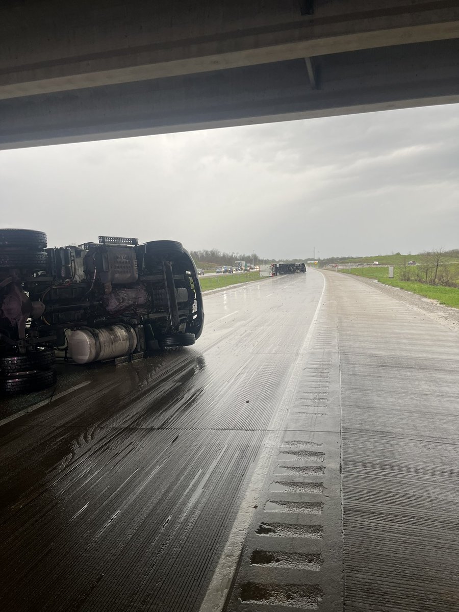 WHAS11's tweet photo. Multiple vehicles flipped over on I-265 near the Lewis and Clark Bridge in Indiana after a powerful storm moved over the river, producing a tornado in the Prospect area. |  LIVE UPDATES: https://t.co/DOfHyzMMyB

📸: ISP Sgt. Carey Huls https://t.co/1oPW8R8TWs