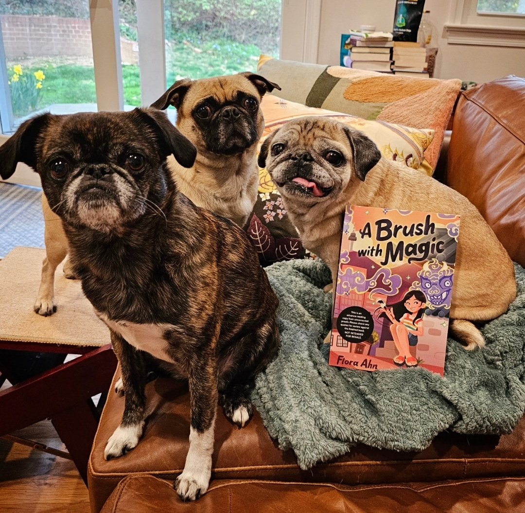 Have you ever seen better spokesmodels than these 3? ARCs of my book, A Brush with Magic, have arrived. There's nothing like that feeling of holding an actual book with the story you've written inside. Pika said she can't wait to take a copy outside for a good chew...er, read.
