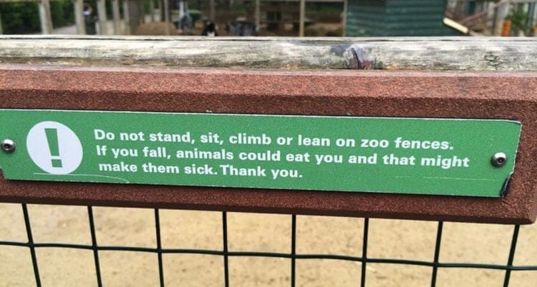 I love this sign so much, both as an animal lover and a NLP geek -- it's both literally true and sarcastic.😁