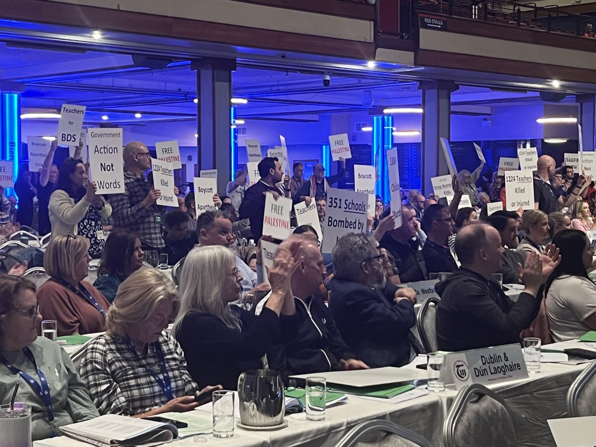 Teachers' Union of Ireland members demonstrating against Israel's invasion of Gaza during addresses by Minister Norma Foley and union leadership at the TUI's annual conference this morning