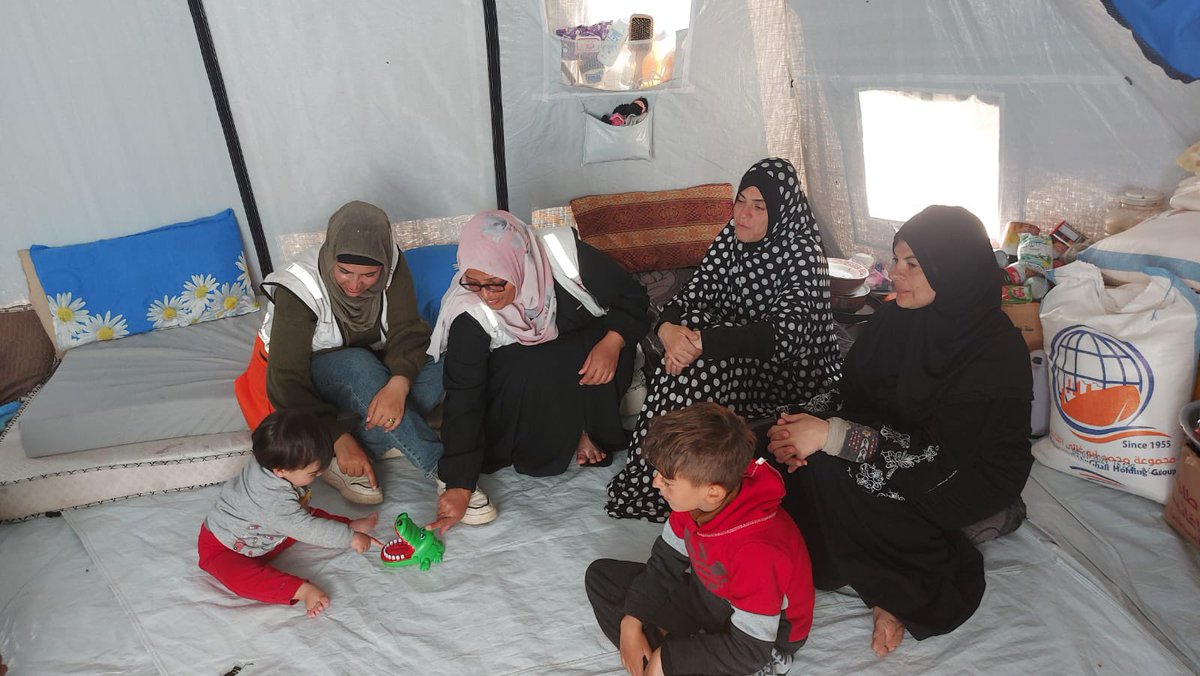 PalestineRCS's tweet photo. The PRCS psychosocial teams are conducting home visits to several families of martyrs, detainees, and wounded individuals among the employees and volunteers of the Palestine Red Crescent Society in the #Gaza Strip to check on their well-being. #Humantarians https://t.co/ShAy2xRoCL
