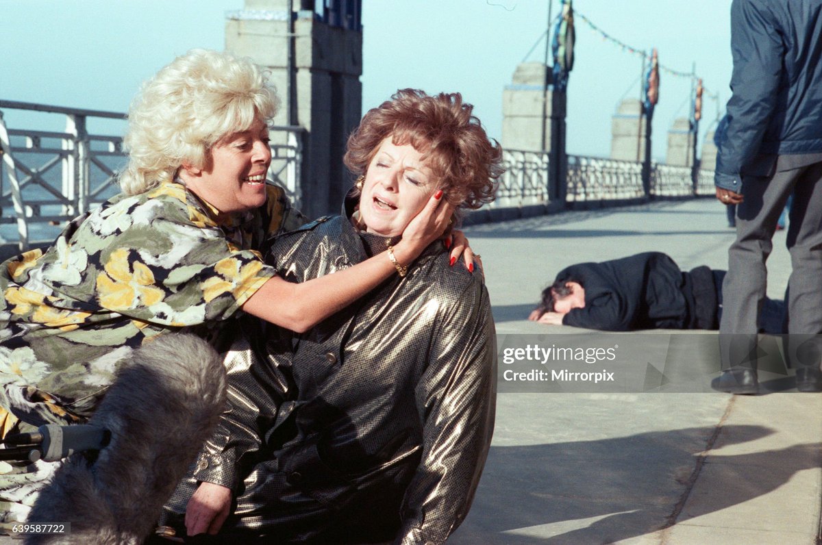 The cast of 'Coronation Street' filming scenes for death of Alan Bradley storyline in Blackpool. Julie Goodyear as Bet Lynch and Barbara Knox as Rita Fairclough. (1989)