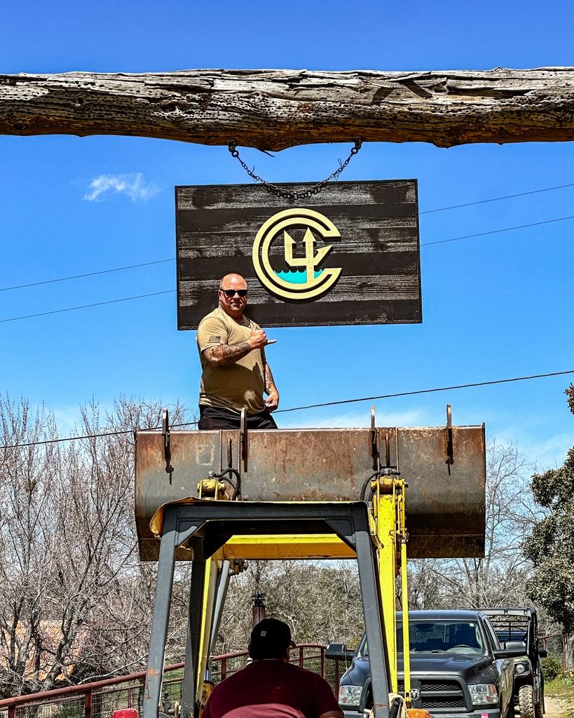 Ranch improvements underway 🚜🚧 Thank you @angelcityoutlaw @planksandanchors for our new C4 sign hanging at the ranch entrance to welcome our SEAL families!

#NavySEALFamilies #C4Foundation #militarycommunity #C4Ranch #planksandanchors #woodwork