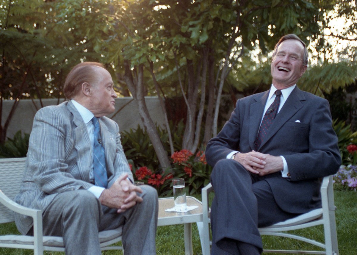 President Bush and Bob Hope share a laugh in the Pool Garden at the Four Seasons Hotel, Newport Beach, California. 04 Apr 1991  Photo Credit: George Bush Presidential Library and Museum #bush41 #bush41library #bush41museum