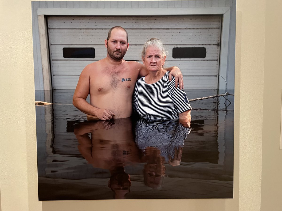 Daybook: Posing in the waist-deep flood that has inundated their home. Gideon Mendel (from 2017) in the Coal + Ice exhibit at the @AsiaSocietyNY. collectordaily.com/gideon-mendel-…