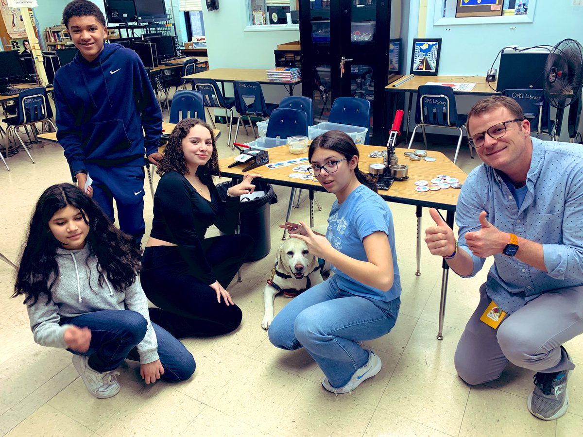 LIB_OMS's tweet image. Lovely afternoon with Mr. Stertz, the OMS GSA and of course, Willow, making buttons and magnets for some upcoming events. @OMS_NY #buttonmaking #middleschool  #librarylife #GSA #BeKind #ally