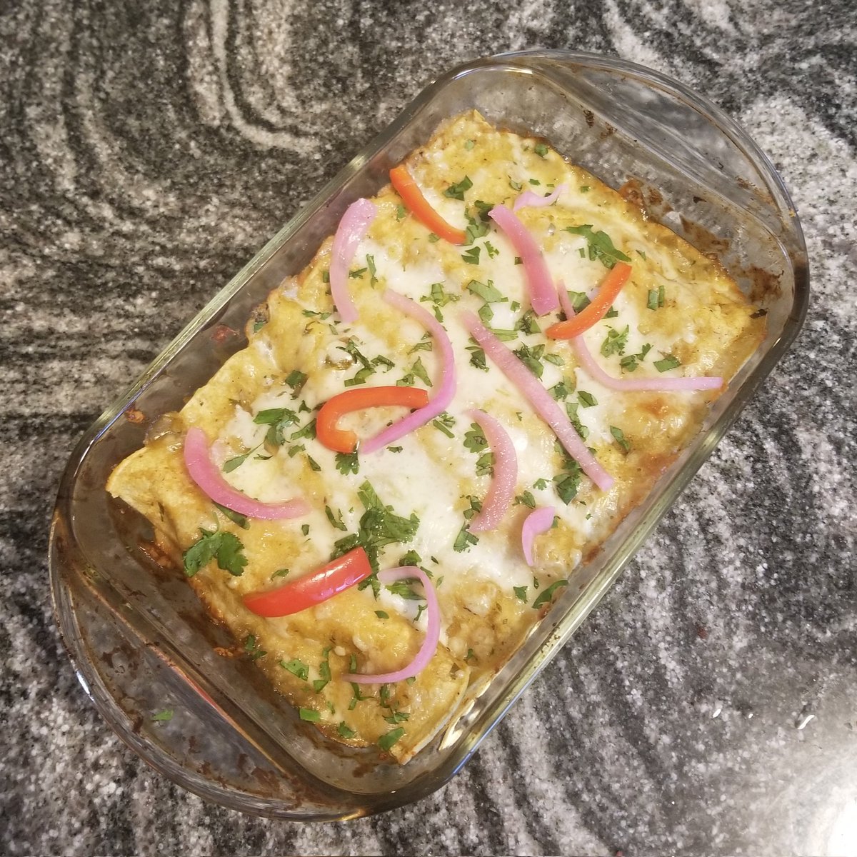 I've been making mini pans of enchiladas verdes lately. The first one is with queso fresco and the other one is with oaxaca and some pickled onions & peppers. Great weeknight meal, though they can also theoretically be made on weekend nights if you're a rule breaker and a rebel.