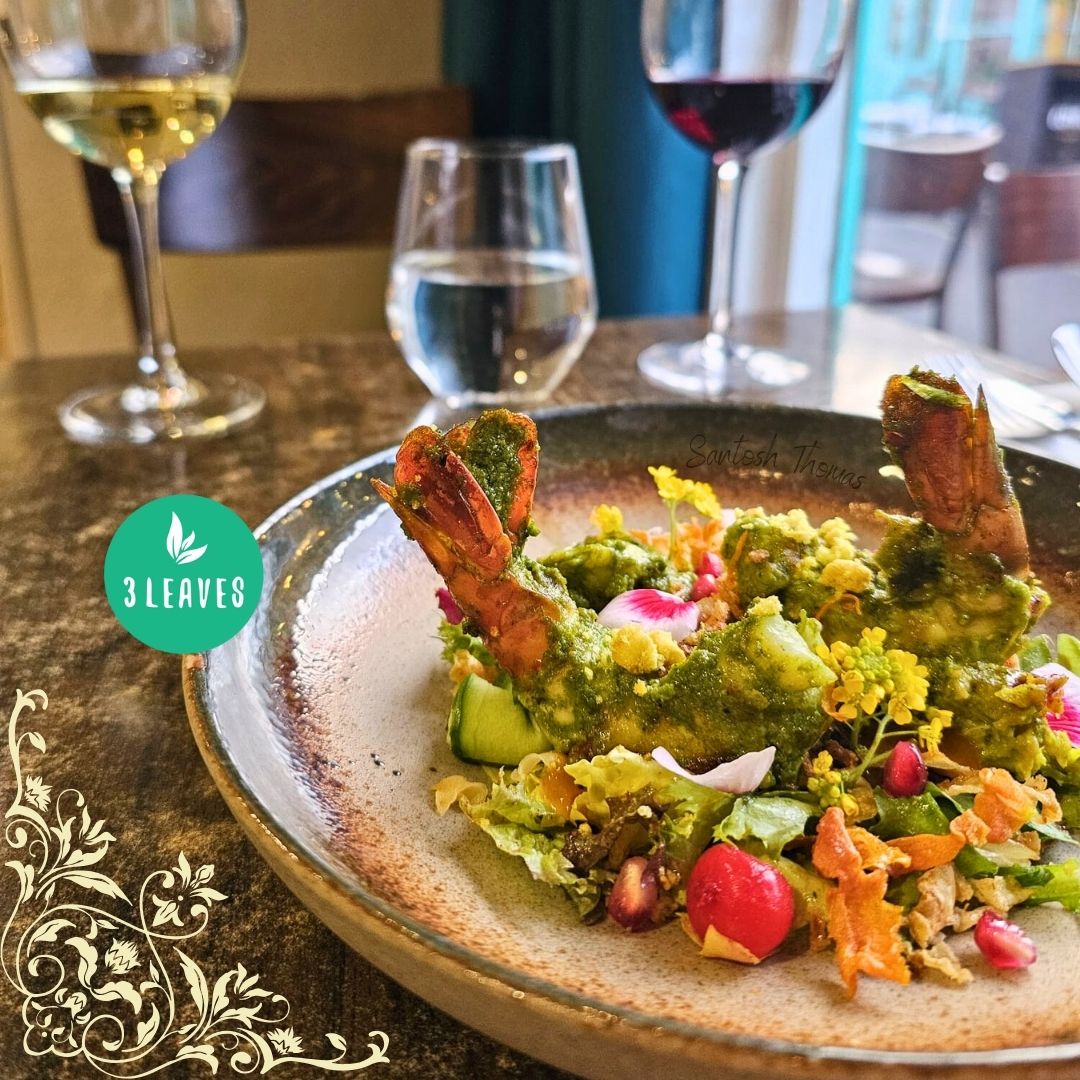Nilgiri Prawns : thrice marinated jumbo prawns with most scrumptious salad... yum....🫠 One of our most popular seafood starters, perfect with our selection of white wines 🥂.. Have you tried it yet? Available on our 2 course dinner menu. Tap on our profile link to book a table