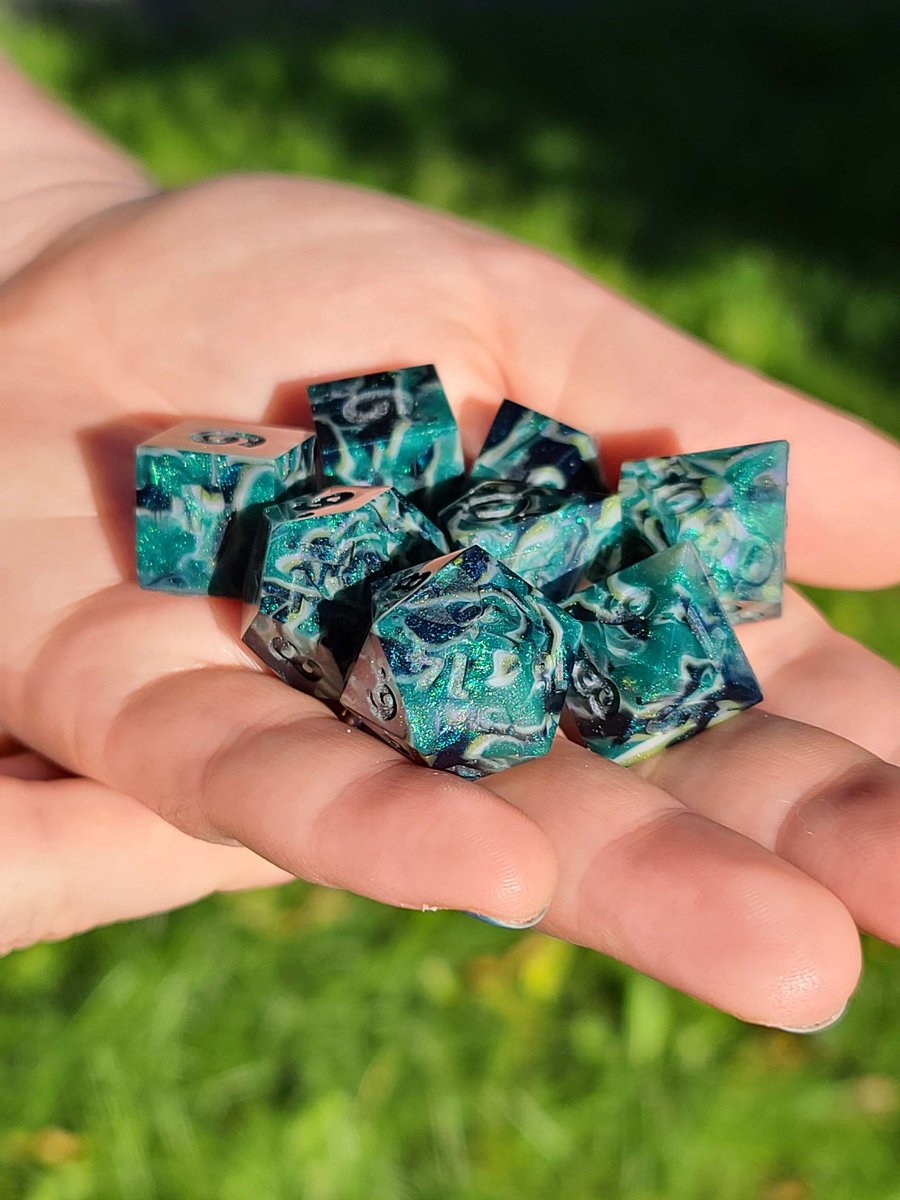 KarMothDice's tweet photo. It's really icky outside, so enjoy a photo of uninked #dice from a much nicer day last summer 🌞

#handmadedice #madeincanada #resindice #dungeonsanddragons #ttrpgs https://t.co/PWU6V76WpU