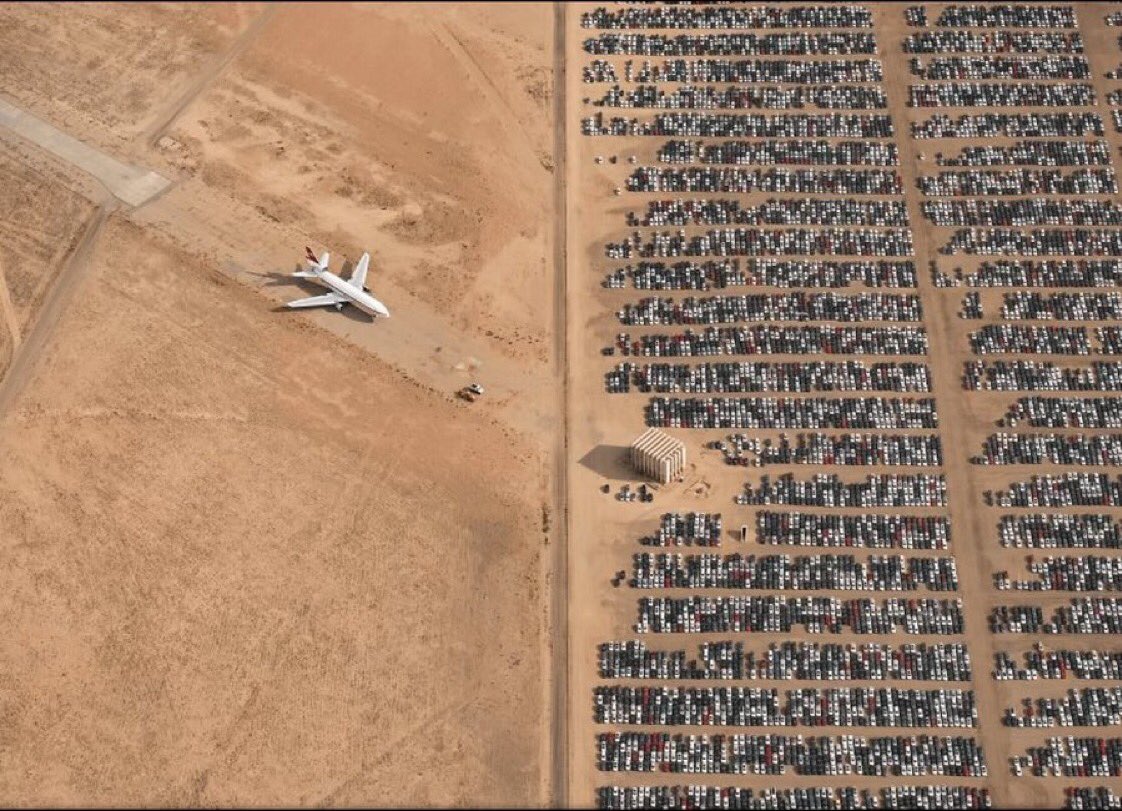 Photo taken by Jassen Tadorov shows thousands of Volkswagen and Audi cars sitting idle in the middle of the Mojave Desert. Vehicles produced between 2009 and 2015 were engineered to deceive emissions tests required by the United States EPA. Following the scandal, Volkswagen…