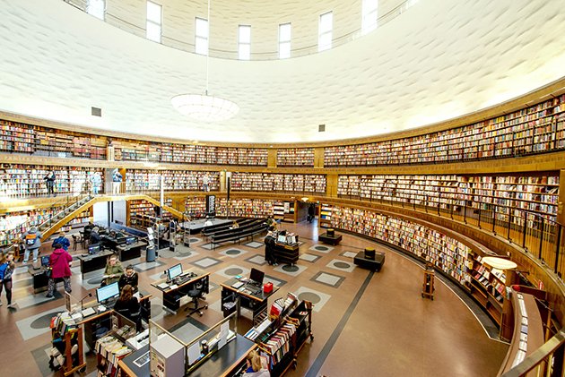 After many fruitful visits to the Kungliga Biblioteket here in Stockholm, I finally joined the Stadsbiblioteket today. A modern classicist temple to learning, photographs (even these great ones, which are not mine) cannot not convey its quiet, cool, grandeur.