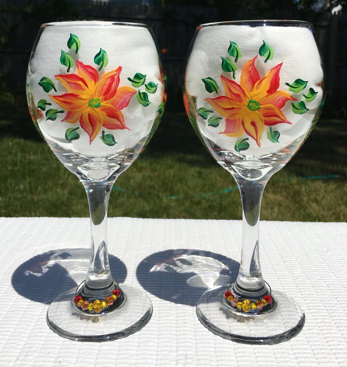 Brightly painted wine glasses etsy.com/listing/834904… #wineglasses #handpaintedglasses #art #SMILEtt23 #CraftBizParty #summerglasses #mothersdaygift #etsygifts #etsyshop