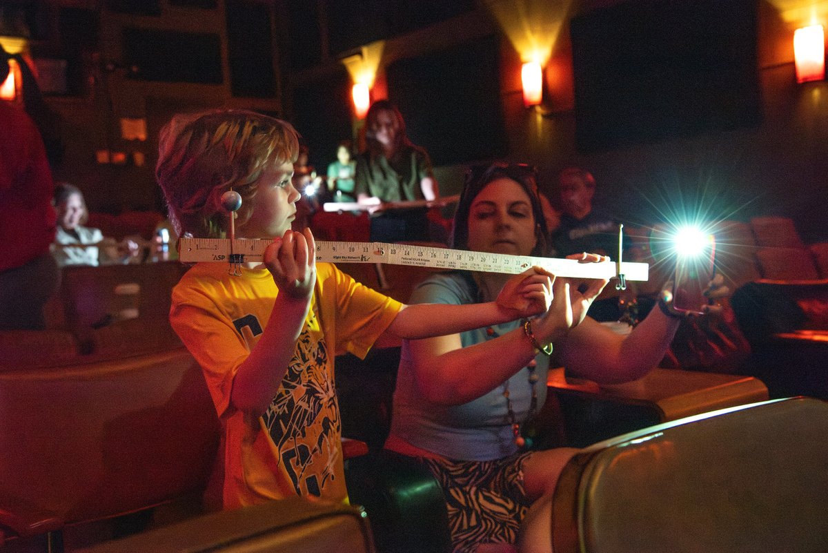 Are you excited for next Monday's solar eclipse? @Mizzou grad student Teja Teppala talked about it during Saturday Morning Science March 30 at @RagtagCinema. Here Mariah Mills helps Lazarus Feeney see how the moon blocks the sun's light using a phone & rulers. @MizzouResearch