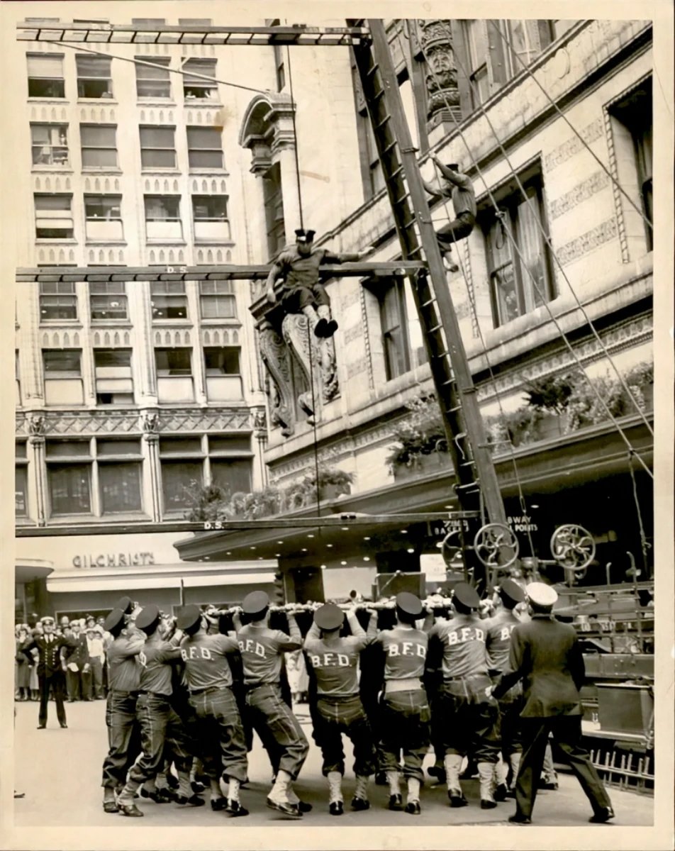 BFD demonstration of life net technique during Fire prevention week Summer & Washington 1951. @BostonFire